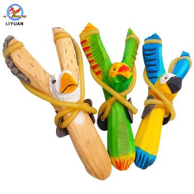 China Manufacturer Supply Professional Hunting Outdoor Hunting Release Device Wooden Animal Slingshot for sale