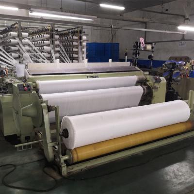 China Water Base Fabric Artificial Turf TONGDA Water Base Jet Loom TONGDA Primary Grass Backing Weaving Machine for sale