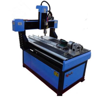 China Mini Wood Hotels Desktop CNC Router Machine 3d 4 Axis mach3(usb) 600x900mm Rotary Controller for sale