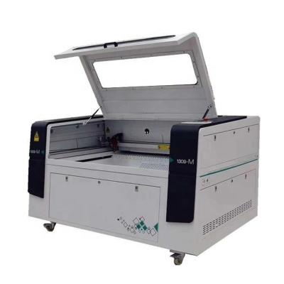 China Water Cooled CO2 Laser Engraving Machine for Cutting Wood Plastic Acrylic Leather Rubber Glass 1390 for sale