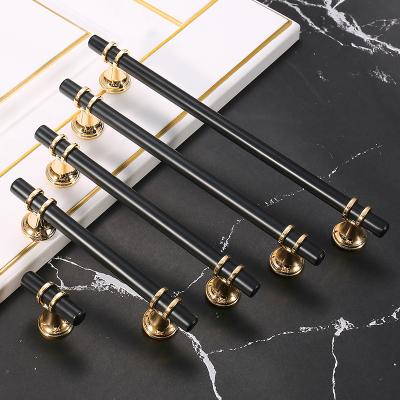 China Contemporary Luxury High-end Simple Modern Single-Hole Drawer Cupboard Door Handle Small Gold Wardrobe Handle for sale