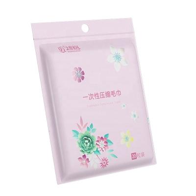 China Child Safe Compressed Towel Travel Portable Clothes Thickened Towel Square Small Pure Cotton Disposable Face Towel for sale