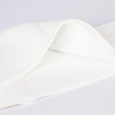 China Quick-drying cheap environment-friendly white soft non-woven hotel disposable bath towel child-safe for sale