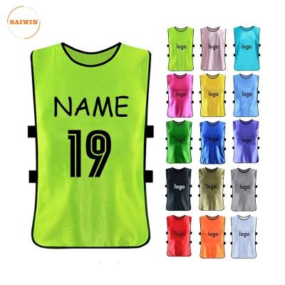 China Sets Wholesale Cheap Price 100% Polyester Sports Training Bibs Mesh Football Training Vest Bibs with belt for sale