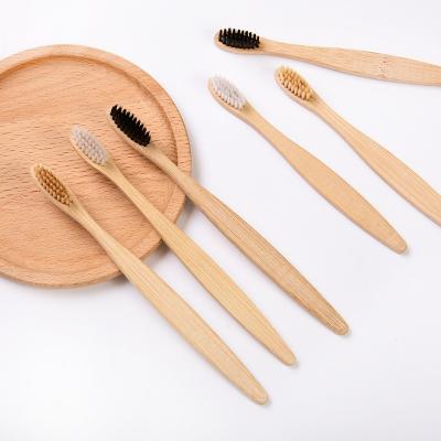 China Durable CE Approved Natural Custom Engraving Logo Charcoal Moso Bamboo Toothbrush for sale