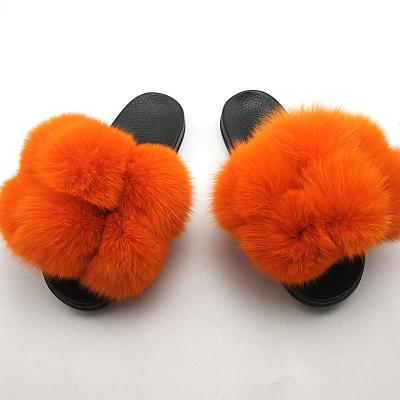 China Winter Anti-slippery Indoor Pom Pom Fur Slides Women's Baby Waist Fur Sandals Outdoors Slippers for sale