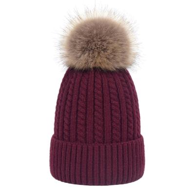 China COMMON Faux Raccoon Fur Pom Pom Hat Beanie Hat With Fur Pom For Women Ladies for sale