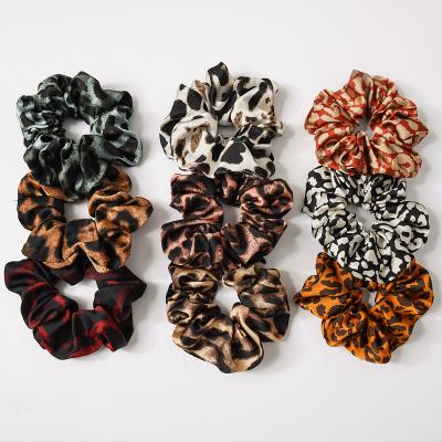 China Insti Soft Comfort Style Europe Fashion Spot Silk Hair Scrunchies Leopard Pattern Hair Bands Hair Ties Ponytail Holder Elastic Wholesale for sale