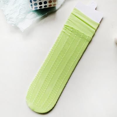 China Sexy Women's Breathable Stockings Net Stockings Summer Long In The Tube Stockings Transparent Elastic Black Cavity Elastic Socks for sale