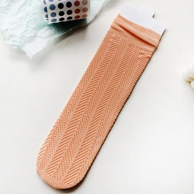 China Hot Selling Soft Girl Breathable JK Transparent Lolita Hoops Cavity Women Fashion Yarn Mesh Color Silk Socks for sale