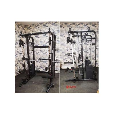 China Eco-friendly Bodybuilding Training Power Cage Squat Stretch Multi Functional Crossover Smith Cable Machine for sale