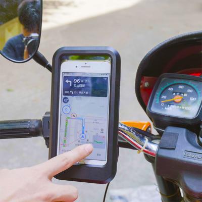 China Motorcycle Navigation Mobile Phone Adjustable Moving Waterproof Magnetic Charging Holder for sale