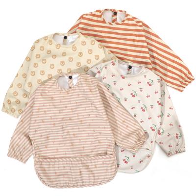 China 2022 New Customized Baby Waterproof PU Bib Washable Easy To Clean Baby Clothes Bib Connection Pocket Design Baby Anti-Dressing for sale