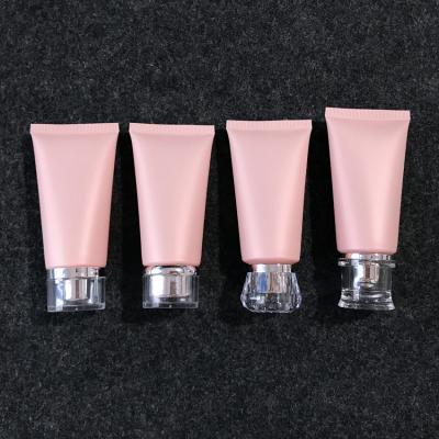 China Cosmetic Wholesale Pink Hose Frosted Sample Plastic Empty Facial Travel Detergent Bottle Cosmetic Bottle for sale