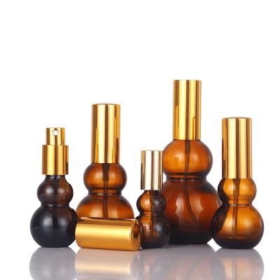 China 2021 hot sale cosmetic double amber gourd essence lotion glass dark brown portable bottle for sale