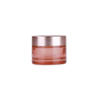 China New Innovative Rose Gold Cosmetic Cream Storage Glass Jars With Lids for sale