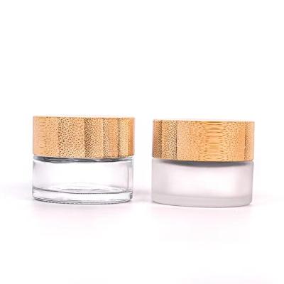 China 15g 30ml 50ml 100ml Cosmetic Packaging Cosmetic Environmental Bamboo Lid Glass Jar Frosted Eye Cream Glass Bottle Container Jars for sale