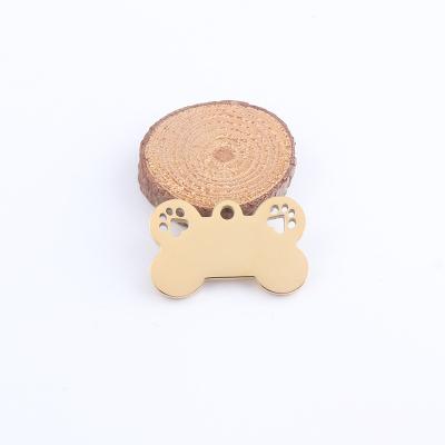 China CLASSIC IP Gold Plated Empty Bone Cavity Dog Paw Charms Mirror Polish Stainless Steel Charms for sale