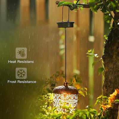 China New Cast Light Decor Outdoor Waterproof Cavity Hanging Solar Lights Lantern LED Metal Garden Lamp for sale