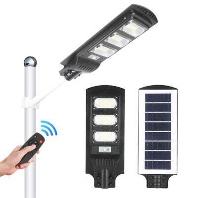 China Outdoor 60w Warehouse Waterproof IP65 Plastic Motion Sensor Integrated Remote Control All In One Solar Led Street Light for sale