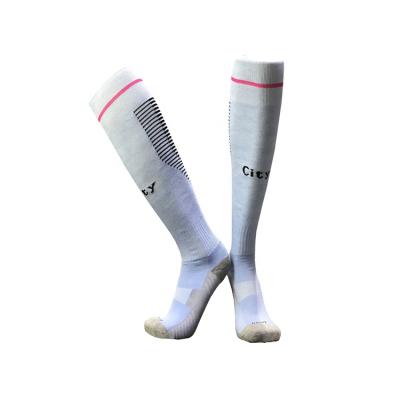 China Anti-Foul Outdoor Compression Sports Grip Non-Slip Football Socks Long Bottom Terry Soccer Socks for sale