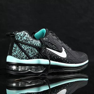 China Fashion Trend Knitted Sports Shoes Women Fashion Jogging Walking Sneakers Fashion Men Athletic Shoes for sale