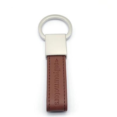 China Custom Free Supermarket Use Zhongshan Desgin Custom Laser Engraved Metal D Shape Keychain Brown Genuine Leather Key Chain for sale