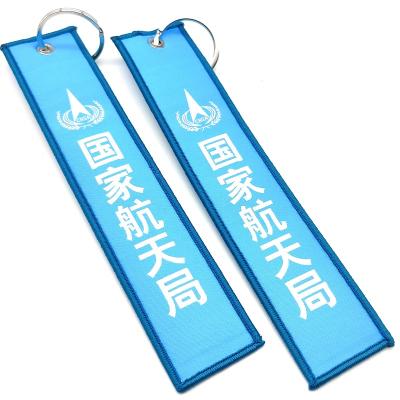 China Portable High Quality Private Textile Ring Tag Personalized DIY Key Logo Woven Fabric Keychains Custom Made For Collections for sale