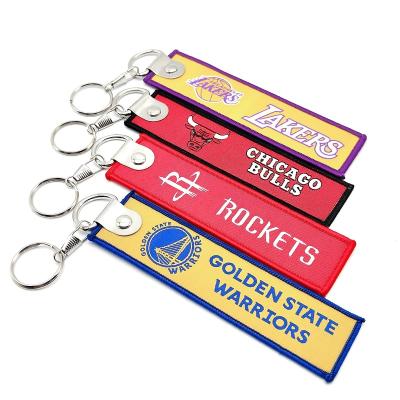 China Portable Wholesale High Quality Custom Logo Keychain Cloth Embroidered Label Letters Woven Key Chain for sale