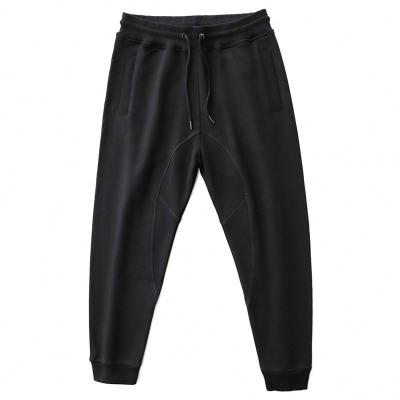 China Anti-wrinkle Men's Black Casual Pants With Drawstring 460G Heavy Beam Foot Cargo Guard Pants for sale