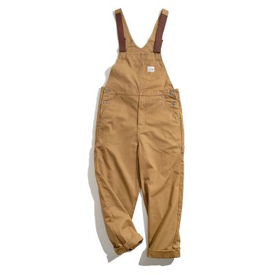 China Breathable Japanese Khaki Overalls Retro Springs and Autumn Ami Khaki Engraved Canvas Suspenders for sale