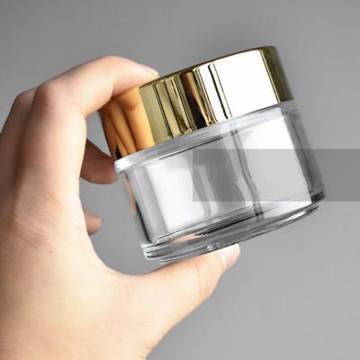 China Personal Care Product Container 50g 100g Clear Cosmetic Glass Jar 30ml 50ml 100ml Cosmetic Cream Jar Glass Jars For Lip Balm Empty for sale