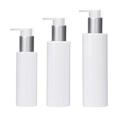 China Custom Logo Cosmetic 100ml 150ml 200ml 250mlwhite PET Shoulder Flat Bottle With Pump Spout Lotion Flat Bottle Cosmetic Package Container for sale