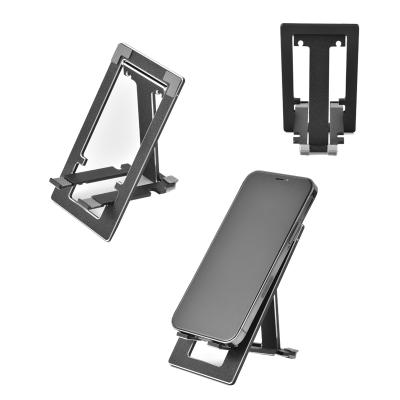 China 2021 Hot Selling Amazon Mini Portable Adjustable Foldable Aluminum Tablet Holder Mount Mobile Phone Holder Stand For iPhone for sale