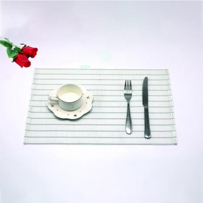 China Low MOQ food place mat rug teslin fabric table mat sustainable place mat for sale