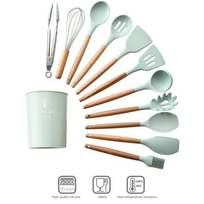 China Viable 12 Pieces In 1 Set Silicone Kitchen Accessories Cooking Tools Kitchen Tableware Cocina Silicone Cookware With Wooden Handles for sale