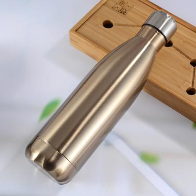 China 17oz 500ml Sustainable Stainless Steel Cola Shaped Sports Water Bottle Wooden Wall Double Vacuum Insulated Coke Cola Shape Water Bottle for sale