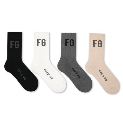 China Men's and women's sports women's hosiery basics couples two-line high street mist letter sports tube medium socks for sale