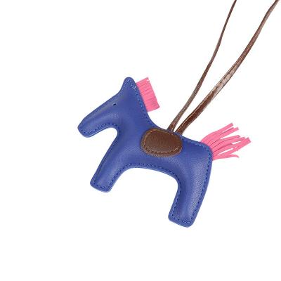 China Nolvo World Romantic Luxury Handmade Leather Horse Keychain Animal Key Chain Women Bag Charm Pendant Accessories Horse Key Chain for sale