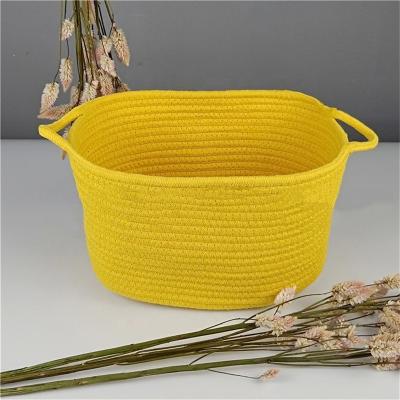 China Customized Viable Color Handmade Yellow Cotton Rope Basket For Home Organization And Decoration for sale