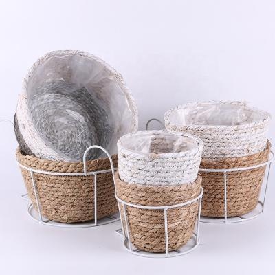 China New Design Modern Antique Metal Rattan Wall Hanging Stackable Garden Pot for sale