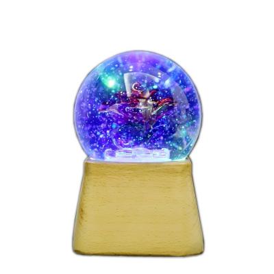 China Gift Factory Customized Hand Crank Operated Red Glass Snow Glass Globe Rose Flower Music Box With RGB LED Light Changing Wooden Base for sale