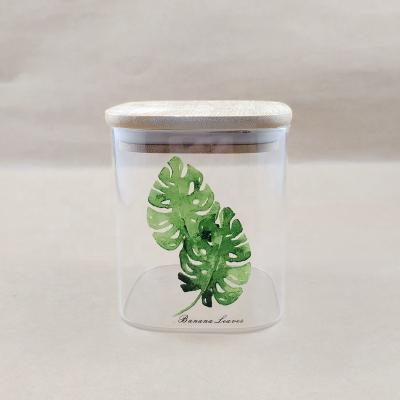 China Direct wholesale design leaf freshness preservation plant banana stash glass jar/jar storage glass bottle/storage food for kitchen storage for sale