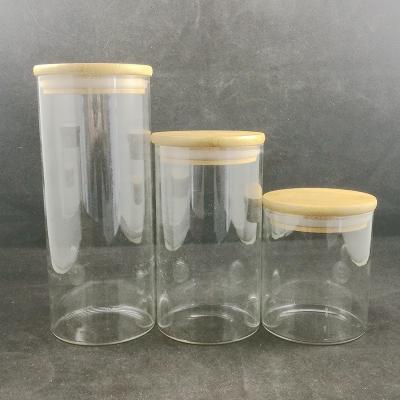 China New Design High Quality Transparent Wholesale Freshness Storage Jar Boro Glass Storage Bottle /Glass Jar With Bamboo Cork Lid for sale