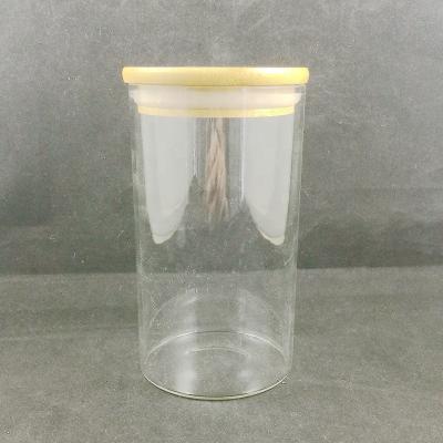 China Factory supply solid wholesale cheap round shape clear stash glass bottle/stash glass jar/storage glass jar with bamboo lid for home for sale