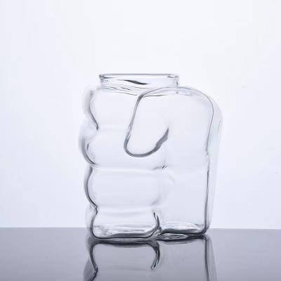 China INS Factory Price Handwork Modern Creative Fist Shaped Colored Glass Vase For Table Top for sale