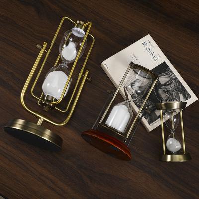 China Nordic Creative Hourglass Light Europe Metal Decoration Desk Shelf Decoration Luxury Handwork Hourglass Timer for sale