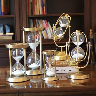 China Creative Hourglass Light Europe Metal Decoration OEM Customs Office Shelf Decoration Luxury Handwork Hourglass Timer for sale