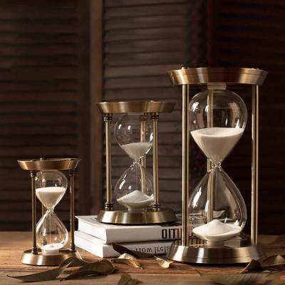 China Contemporary Custom Bronze Glass Hourglass Sand Timer 15 Minutes Metal Sand Brass Hourglass Decorative Desk Sand Timer for sale