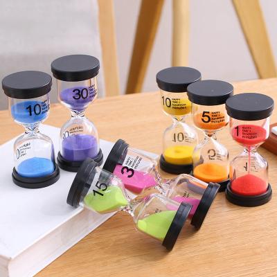 China Direct Selling 1 Minute Modern Plastic Hourglass Custom Creative Drop-proof Children's Game Accessories OEM Factory Hourglass Timer for sale